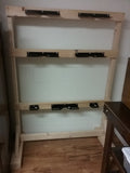 Storage dock for quick change top plates.  Single