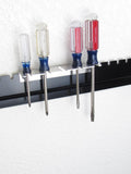 Screwdriver/cleaning rod rack.